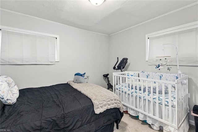 bedroom featuring crown molding and carpet