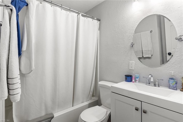 full bathroom featuring vanity, toilet, and shower / tub combo