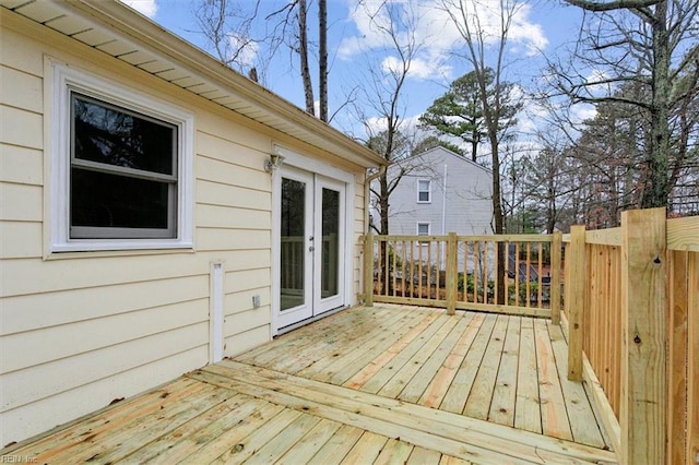 wooden deck featuring french doors