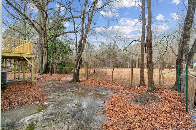 view of yard featuring a wooden deck