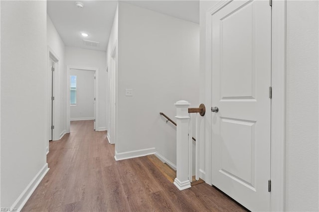 corridor with light hardwood / wood-style flooring