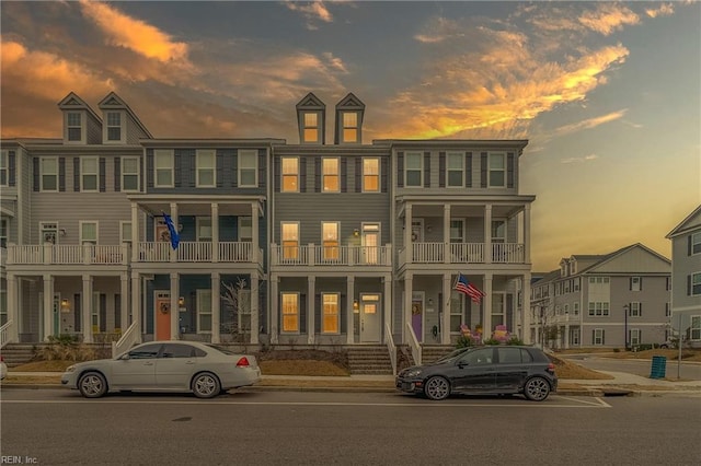 view of outdoor building at dusk