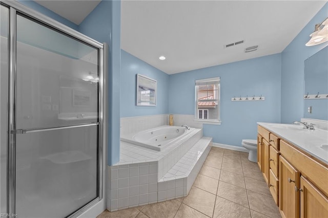 full bathroom featuring vanity, separate shower and tub, tile patterned floors, and toilet