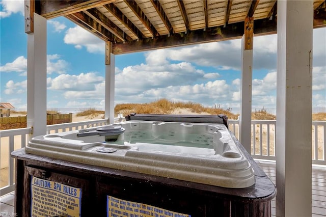 deck with a hot tub