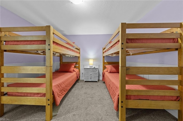 bedroom with light colored carpet