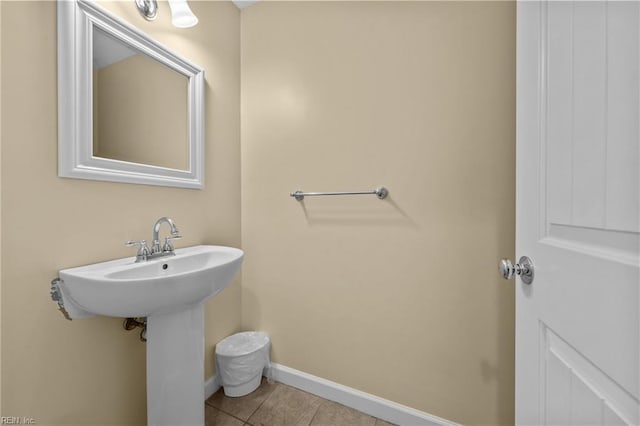 bathroom with tile patterned flooring