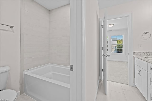 full bathroom featuring vanity, tile patterned flooring,  shower combination, and toilet