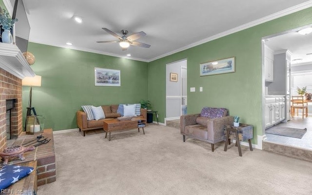 living room featuring ceiling fan, light colored carpet, ornamental molding, and a brick fireplace