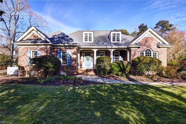 view of front of home with a front yard