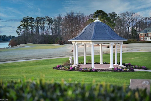 view of yard featuring a gazebo and a water view