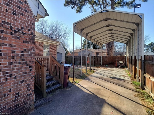 view of parking / parking lot with a carport