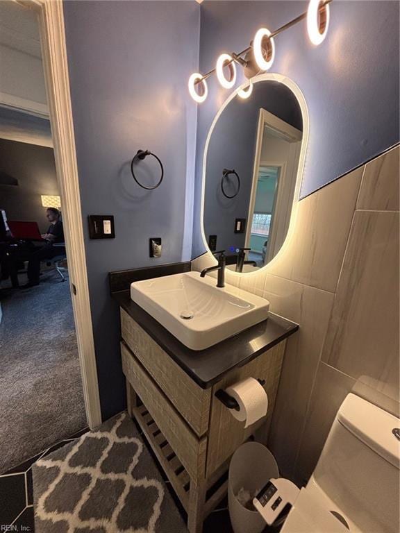 bathroom with vanity and toilet