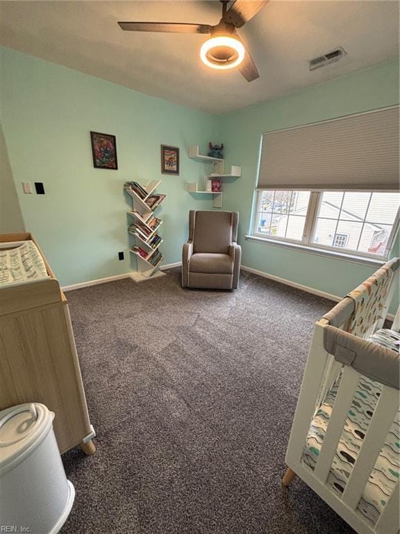 carpeted bedroom featuring ceiling fan