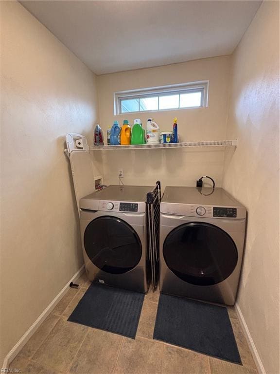 laundry room featuring washer and clothes dryer