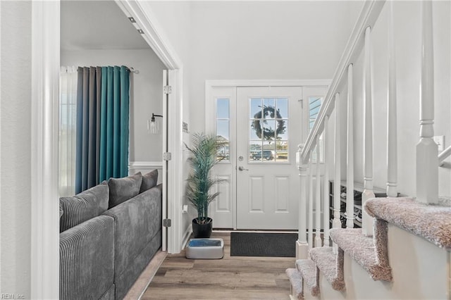 foyer with light hardwood / wood-style floors