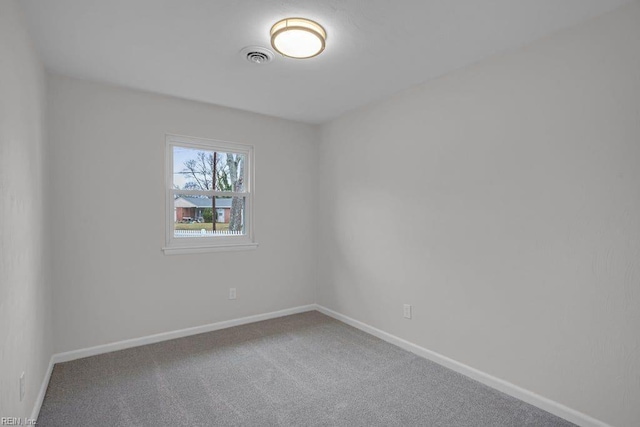 empty room with carpet floors