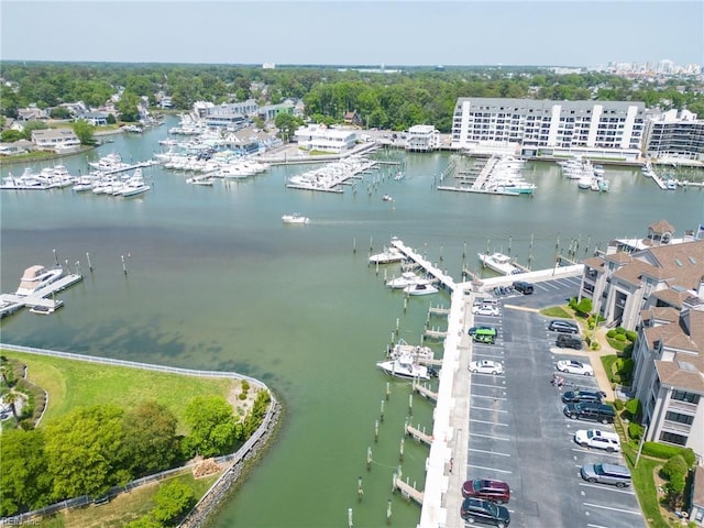 birds eye view of property featuring a water view