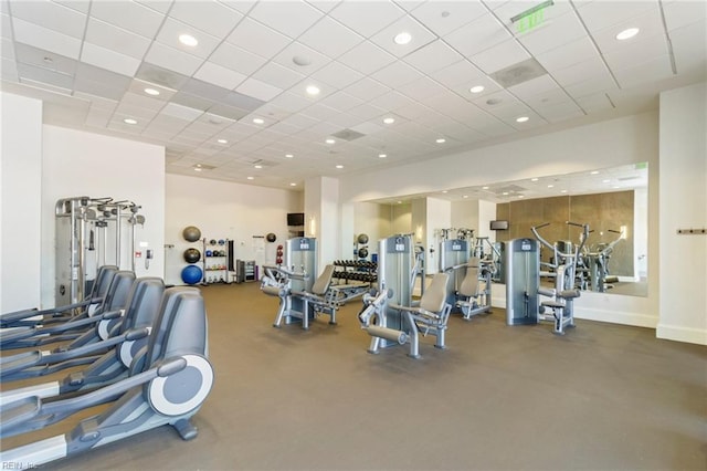 exercise room with a drop ceiling