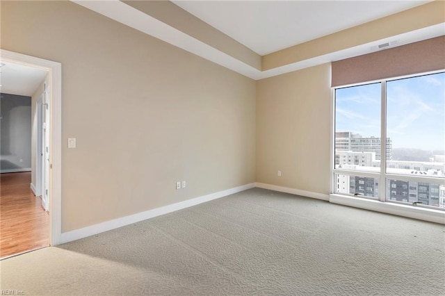 empty room featuring carpet flooring