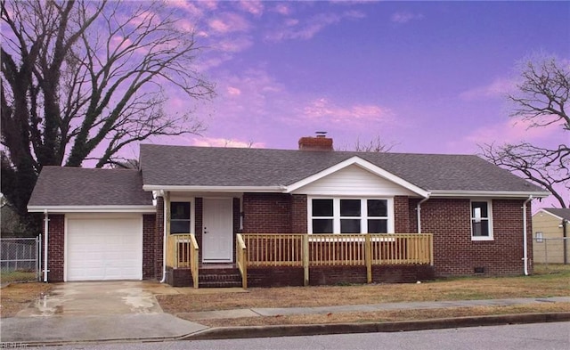 ranch-style house featuring a garage