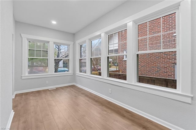 view of unfurnished sunroom