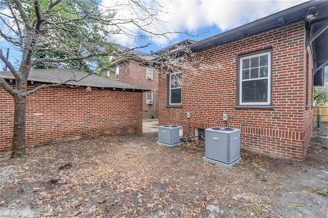 view of side of property featuring cooling unit