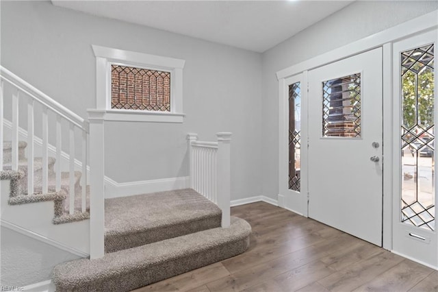 entrance foyer with hardwood / wood-style floors