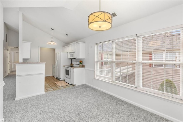 kitchen with high vaulted ceiling, light colored carpet, hanging light fixtures, white appliances, and white cabinets