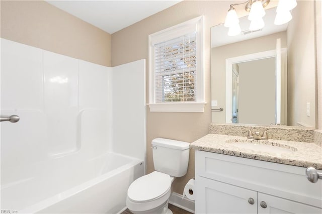 full bathroom featuring vanity, shower / washtub combination, and toilet