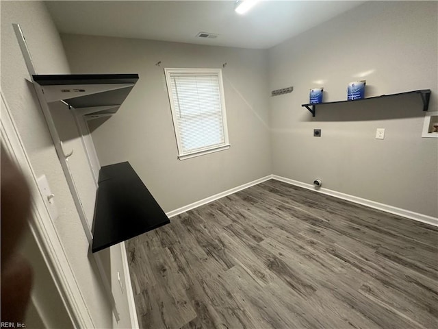 clothes washing area with electric dryer hookup, dark wood-type flooring, and washer hookup