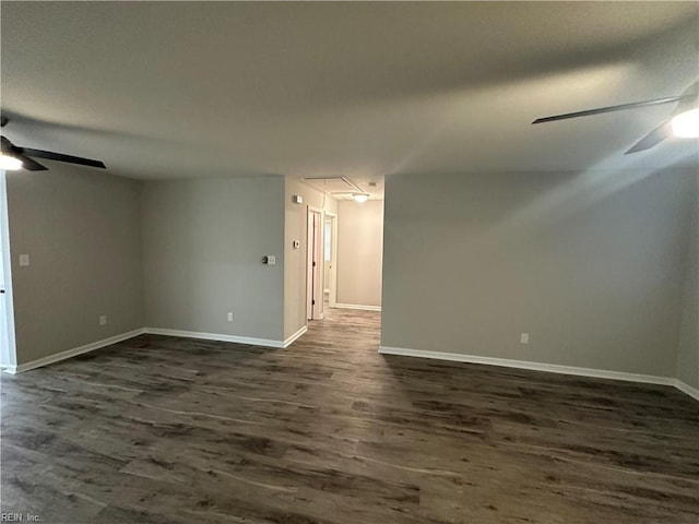 empty room featuring dark hardwood / wood-style floors and ceiling fan