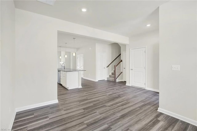 unfurnished room featuring dark hardwood / wood-style floors