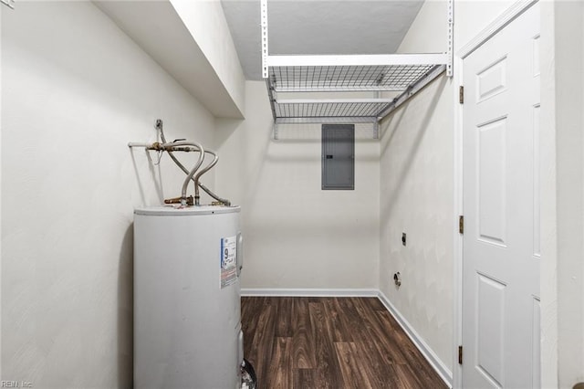 clothes washing area with dark hardwood / wood-style flooring, electric panel, electric water heater, and hookup for an electric dryer