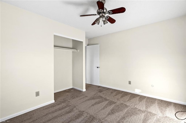 unfurnished bedroom featuring carpet floors, a closet, and ceiling fan