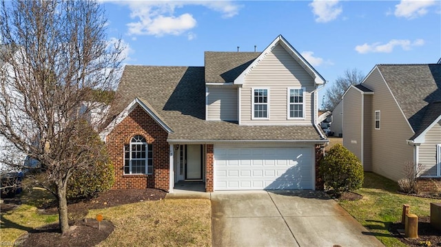 front facade with a garage and a front yard