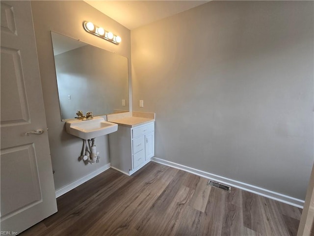 bathroom featuring hardwood / wood-style floors