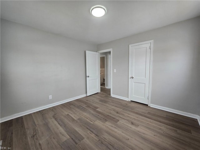 unfurnished bedroom featuring hardwood / wood-style floors