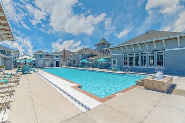 view of pool featuring a patio