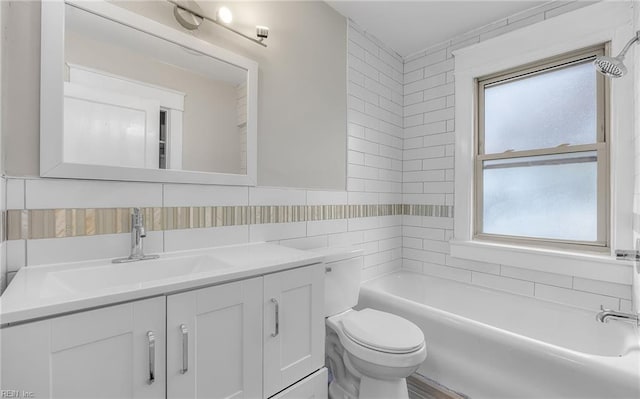 full bathroom featuring toilet, vanity, and tile walls