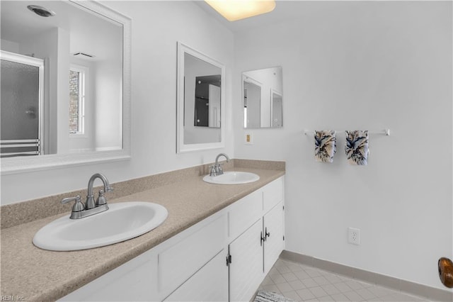 bathroom featuring vanity and tile patterned floors