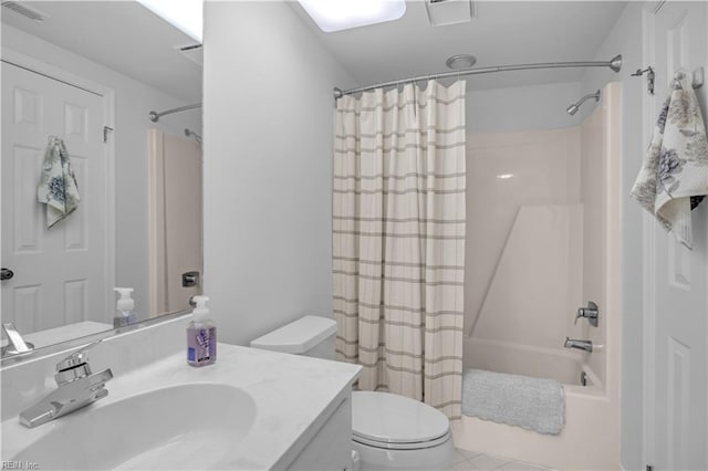 full bathroom featuring vanity, shower / tub combo, tile patterned floors, and toilet