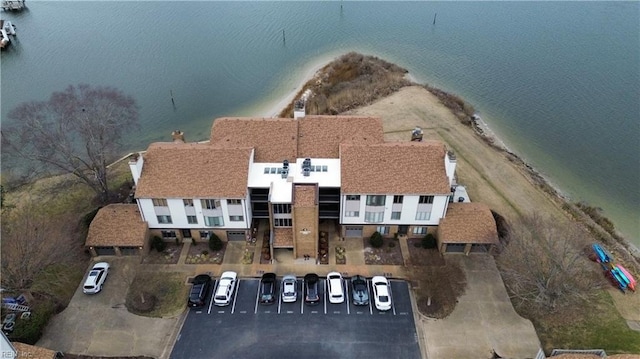 birds eye view of property featuring a water view