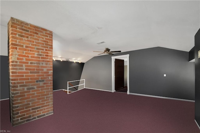 additional living space featuring vaulted ceiling, carpet flooring, and ceiling fan