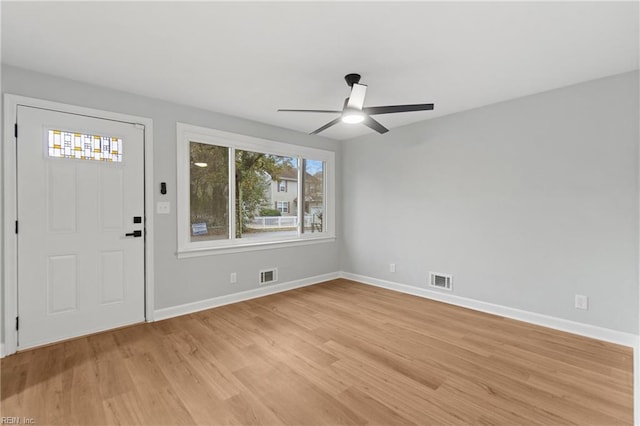 entrance foyer with ceiling fan and light hardwood / wood-style floors