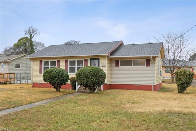 single story home featuring a front yard