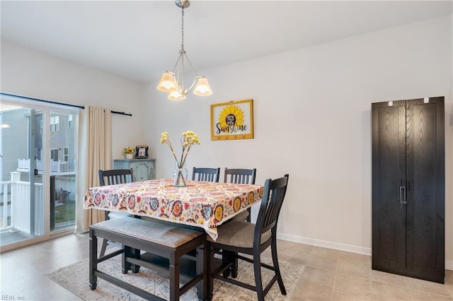 dining area with a notable chandelier