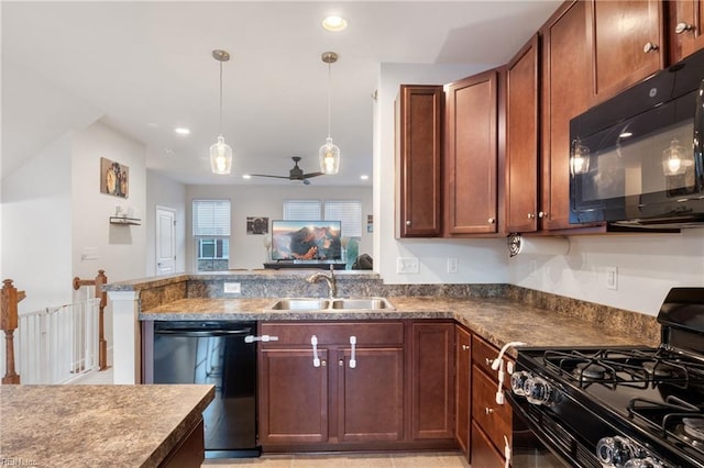 kitchen featuring decorative light fixtures, black appliances, sink, ceiling fan, and kitchen peninsula