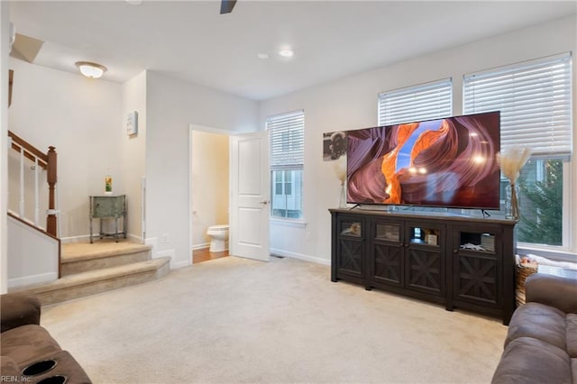 living room with light colored carpet