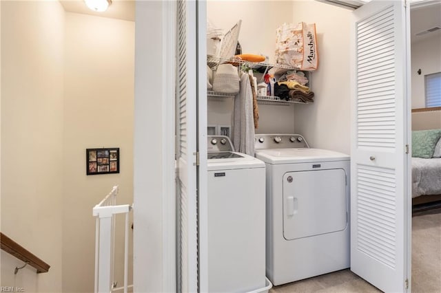 washroom featuring separate washer and dryer