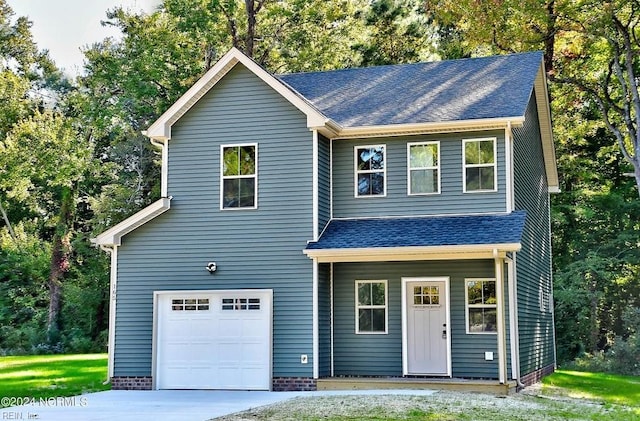 view of front of property featuring a garage